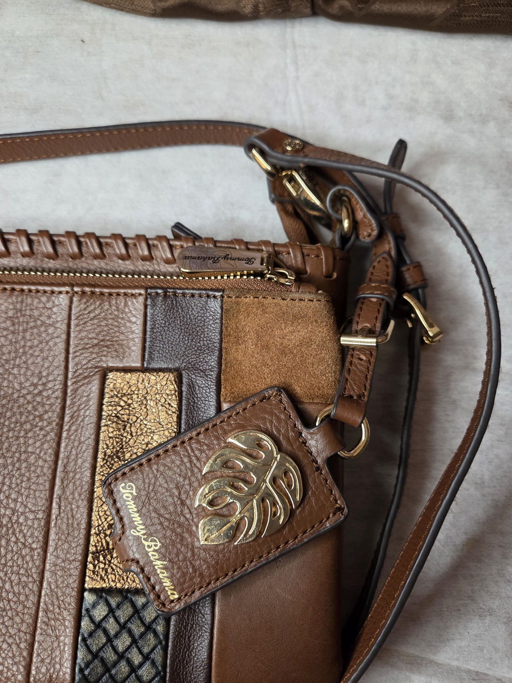 Tommy Bahama Patchwork Leather Crossbody Bag in Brown and Metallic Bronze - Picture 2 of 9
